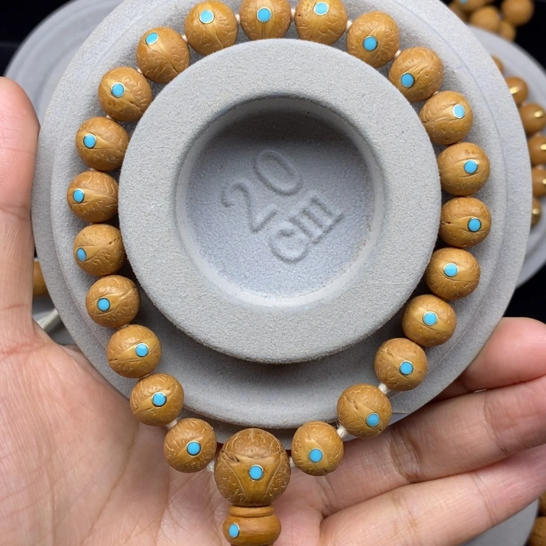 手串凤眼菩提11+新籽松