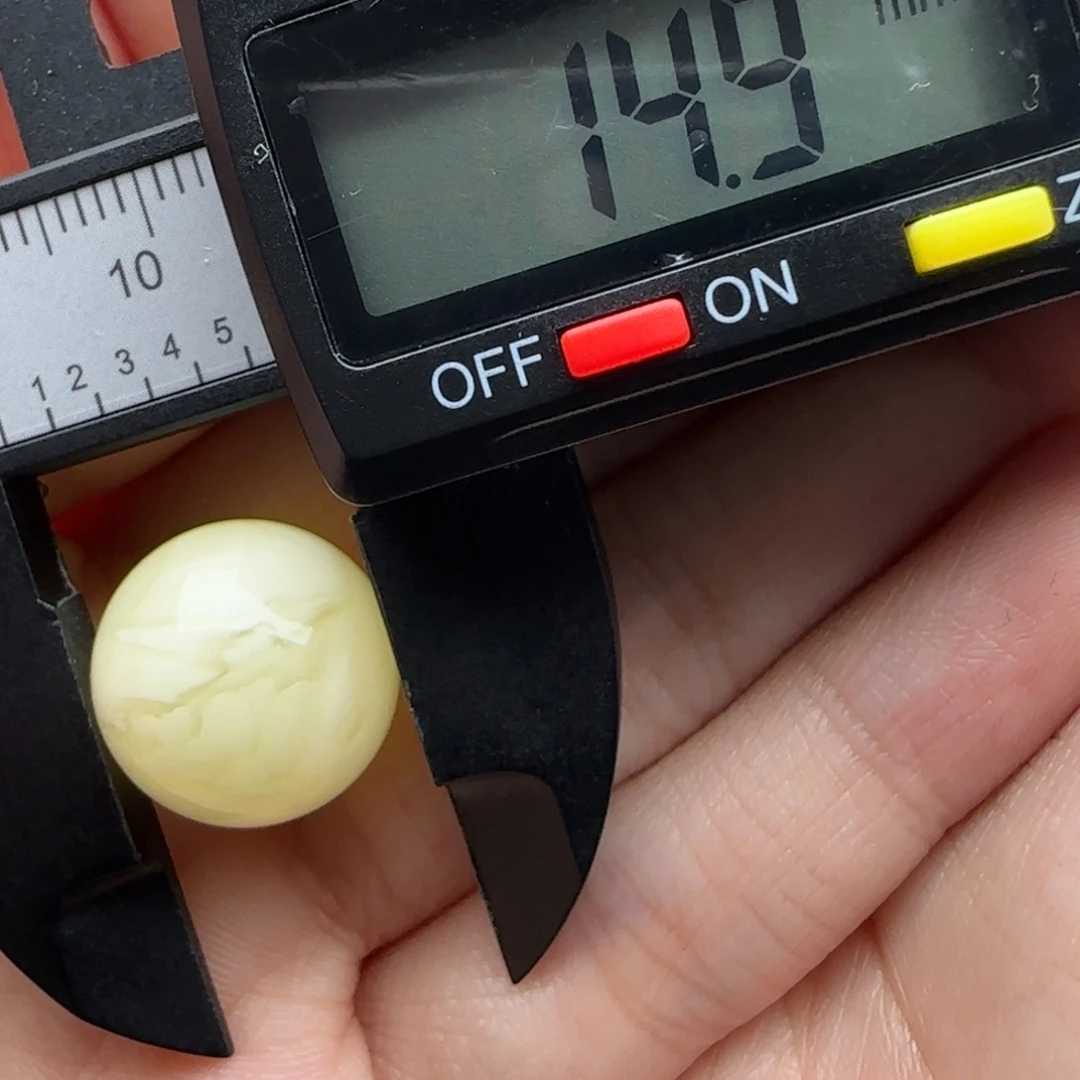 小***。蜜蜡未镶嵌裸石微瑕飘花圆珠