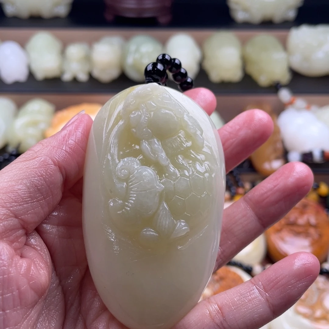 鹰***眼石材古青石手把件