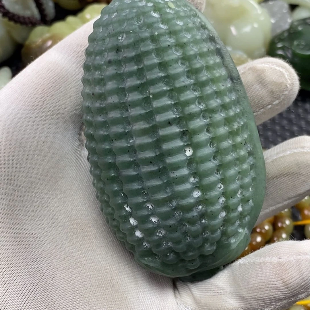 和田玉手把件未镶嵌