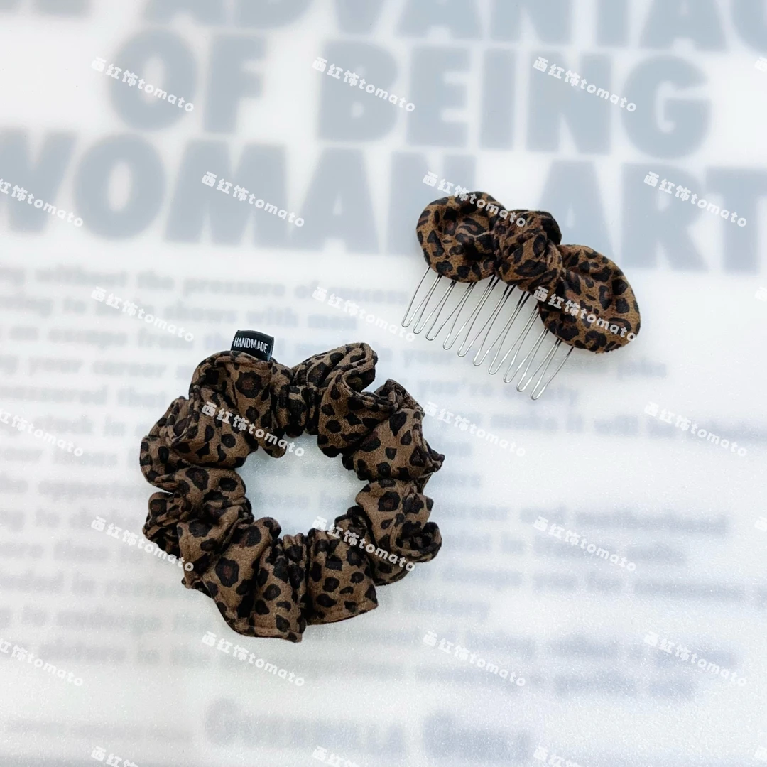西红饰TOMATO韩国东大门 经典豹纹蝴蝶结倒插梳