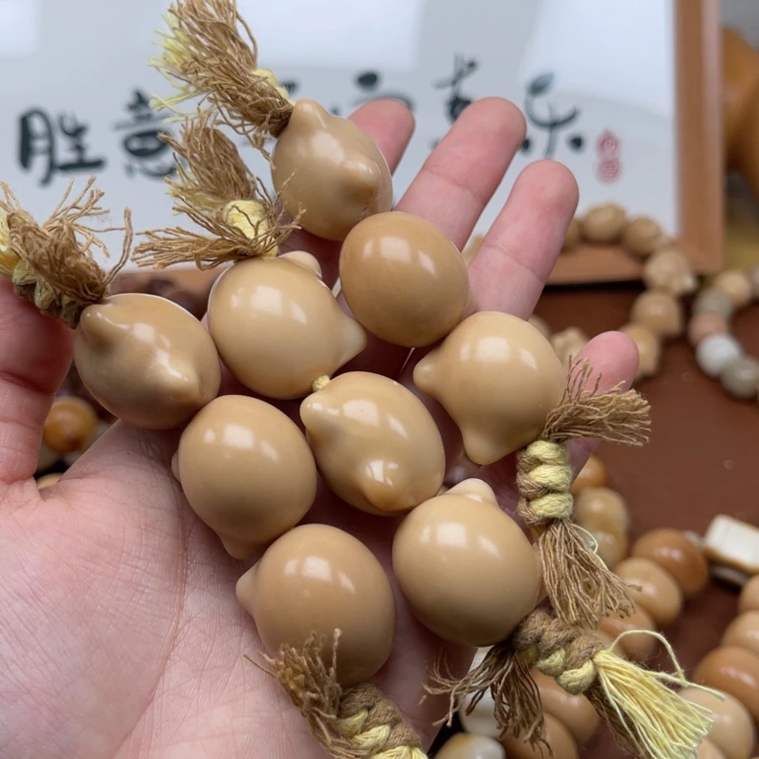 吊坠菩提根/象牙果T28-2猫头22-24微瑕一串随机