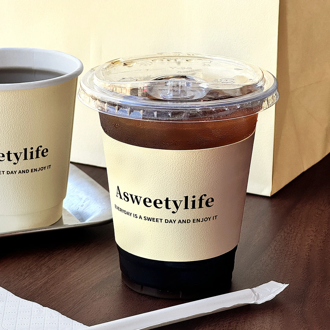 网红咖啡奶茶杯套定制logo一次性可调节通用保护杯套压纹商用批发