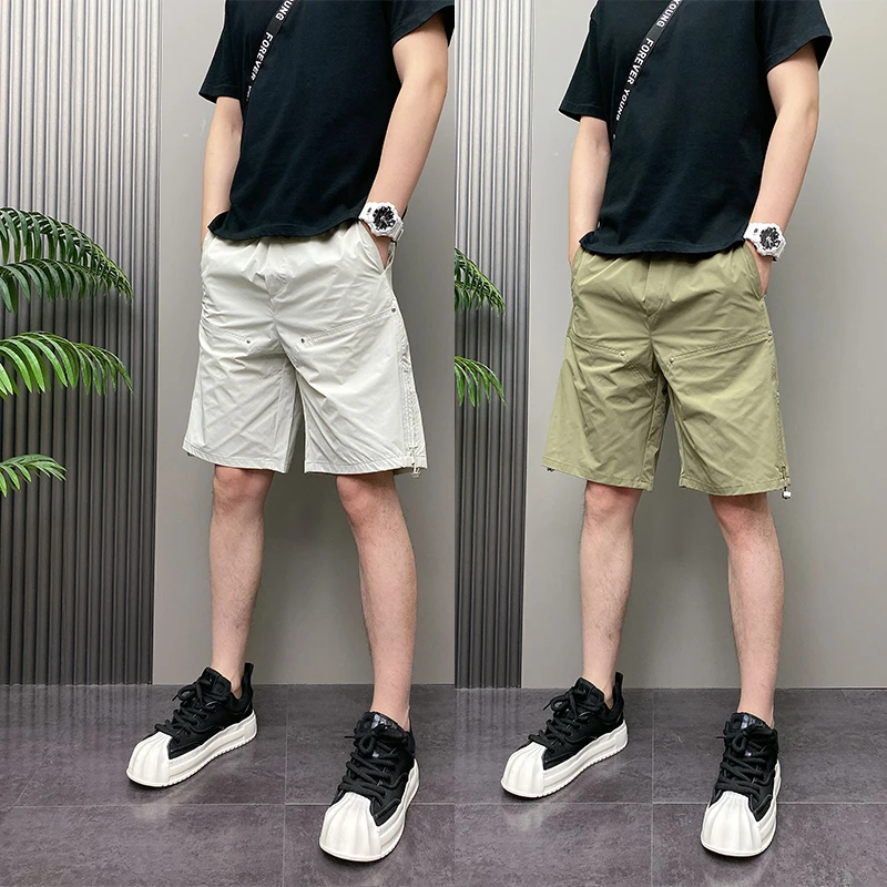 2025年夏季薄款潮流韩版痞帅纯色速干青年男士休闲沙滩四分短裤子