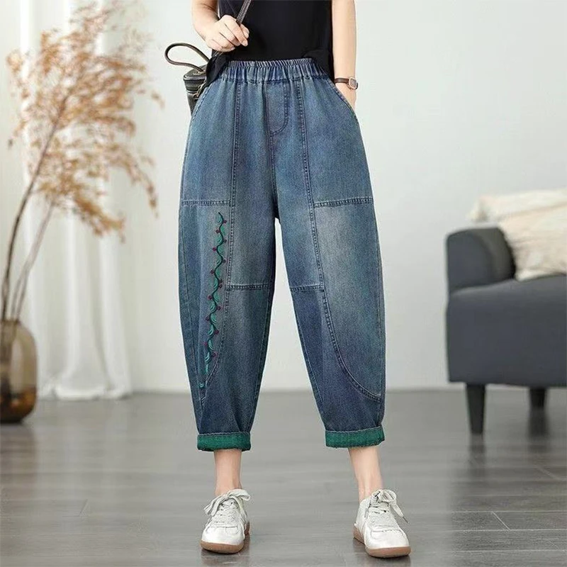 秋季新款简约九分牛仔裤女松紧腰超薄大码宽松显瘦刺绣哈伦裤