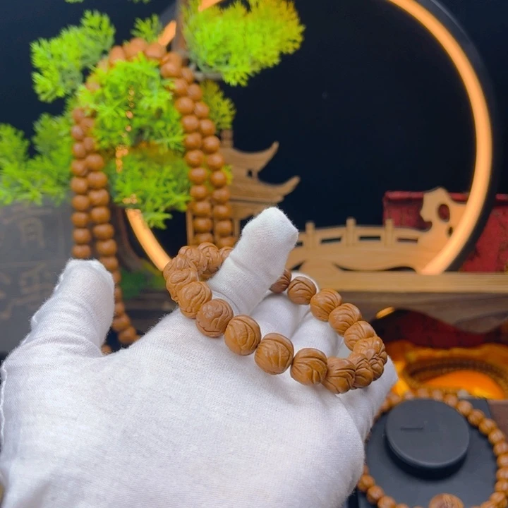 桃核吊坠M****人野生桃核小龙纹单圈