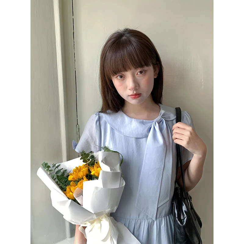 嘿山姥姥浅蓝色连衣裙女夏2025新款设计感蝴蝶结宽松显瘦中长裙