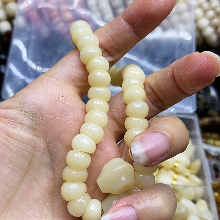 驼骨手串/手链黄****。驼骨手持