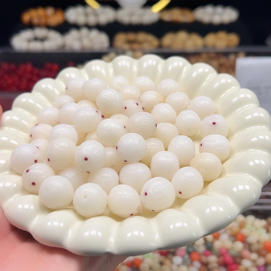 菩提根/象牙果手串瑕疵卡16兔子100颗