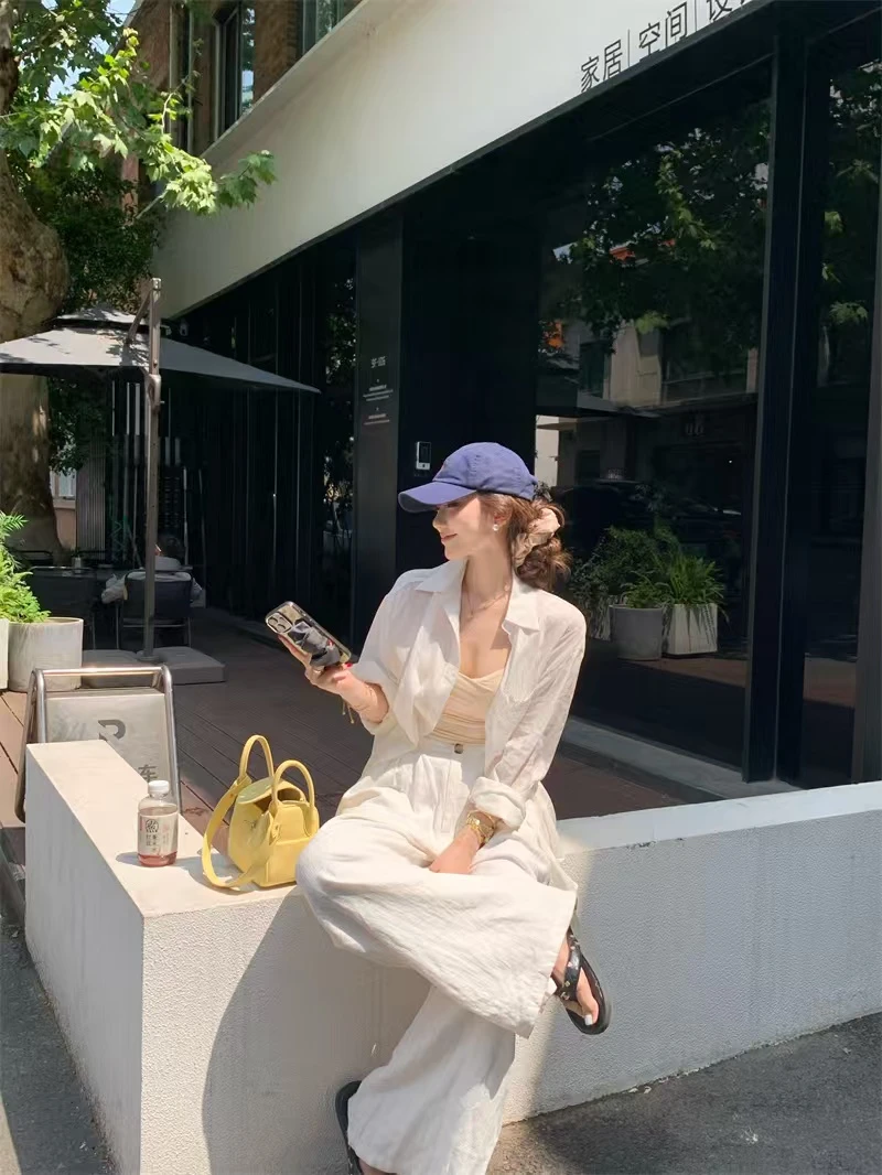 度假风蕾丝衬衫镂空露背小心机薄款法式气质上衣女夏季显瘦休闲裤