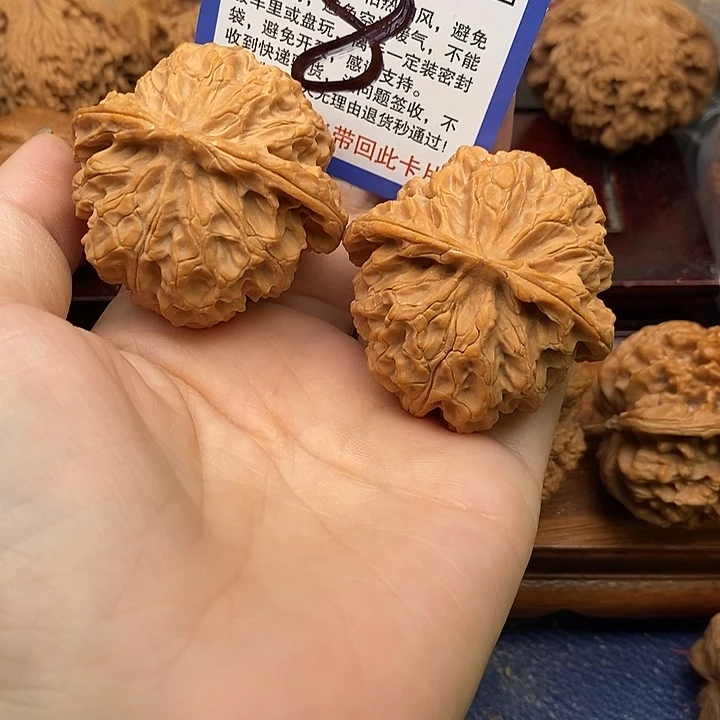 吊坠桃核苹果园狮子头46