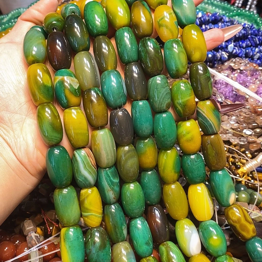 玛瑙/玉髓未镶嵌珠宝半成品天然黄绿玛瑙大孔一条蛋珠