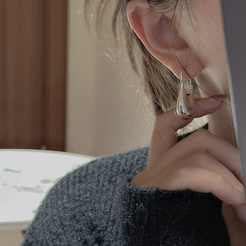 925银耳饰 纯银韩版小众设计感空心耳环韩式风水滴质感夸张耳饰品