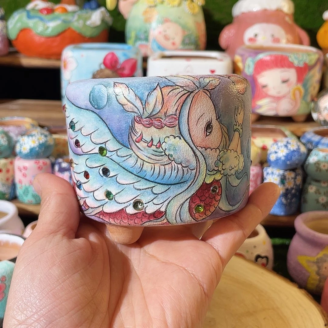 红陶爱***睛手工….美人鱼；爱笑的眼睛