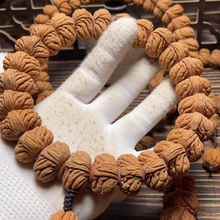 手串桃核五爪持232514