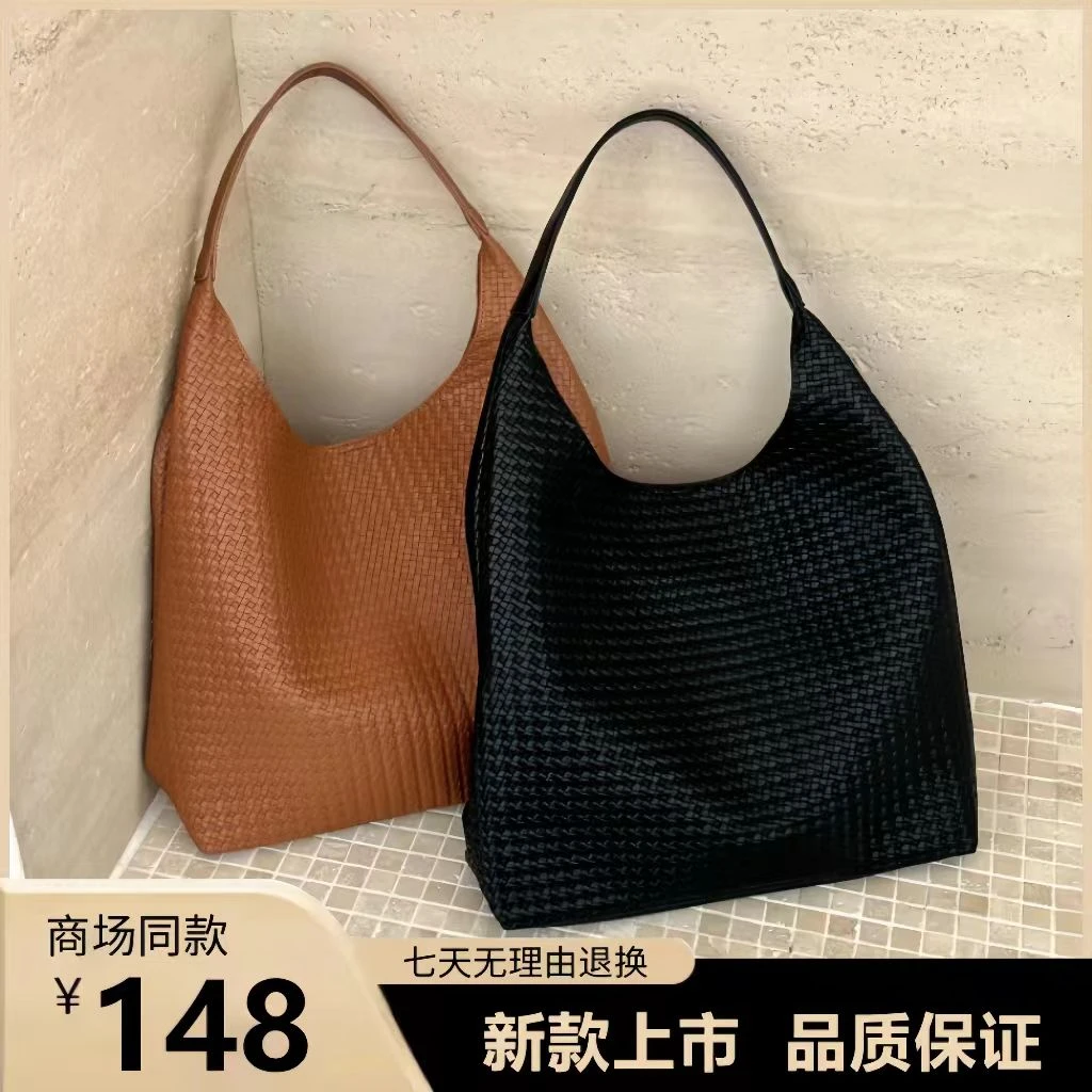 超火手工编织包包女式2025新款潮小众托特包休闲大容量腋下包