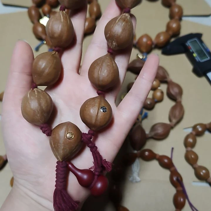 乔***T吊坠橄榄核2328尺寸梅林铁核手串