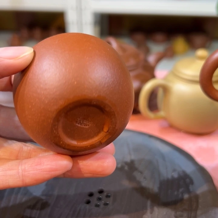 紫砂茶案降坡杯子。