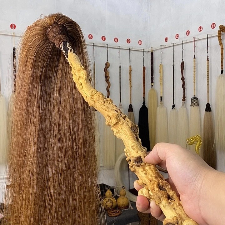 毓***子马尾拂尘一物一拍