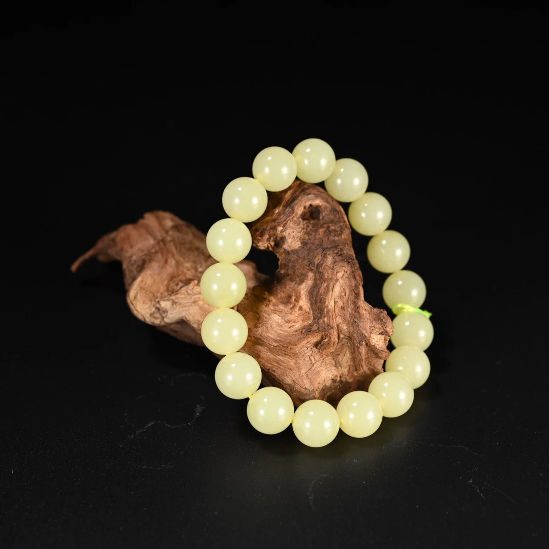 Lot8809 2511050007和田玉黄玉手链/保利