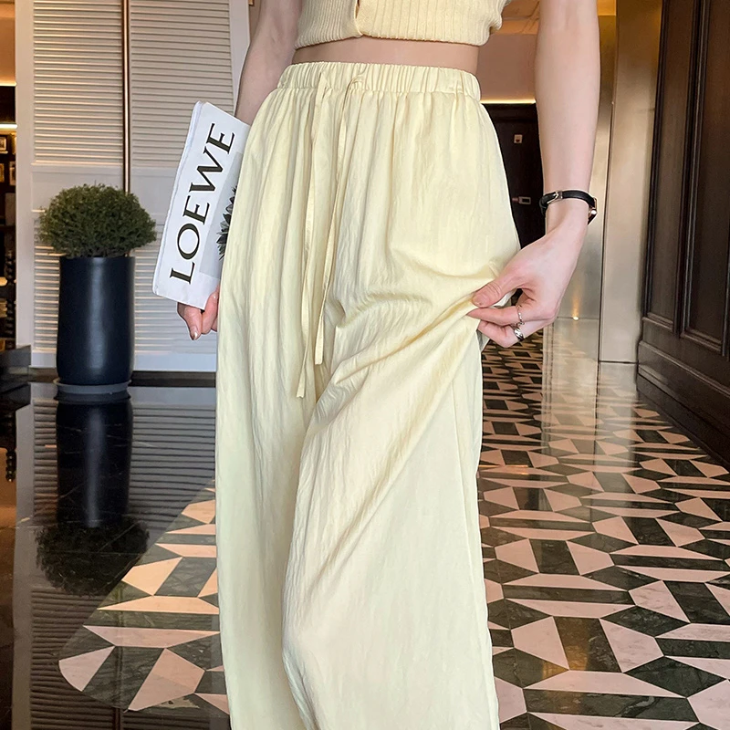 柠檬黄色冰丝高端阔腿裤女2025夏季薄款松紧腰直筒宽松凉感山本裤