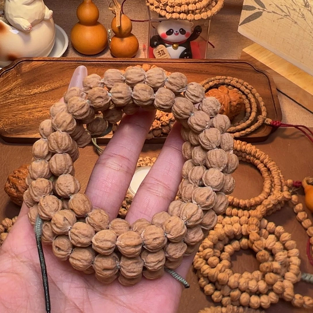 酷***：吊坠柏木原桩小核桃籽型鬼脸长串