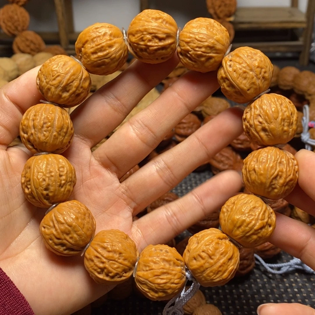 往***就手串文玩核桃光头足球手串