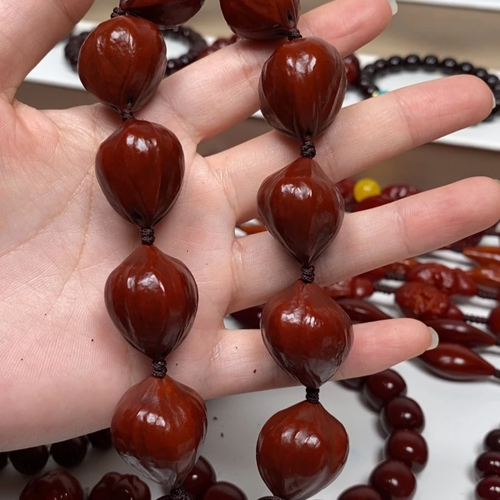 ****花橄榄核雕刻工艺的发展