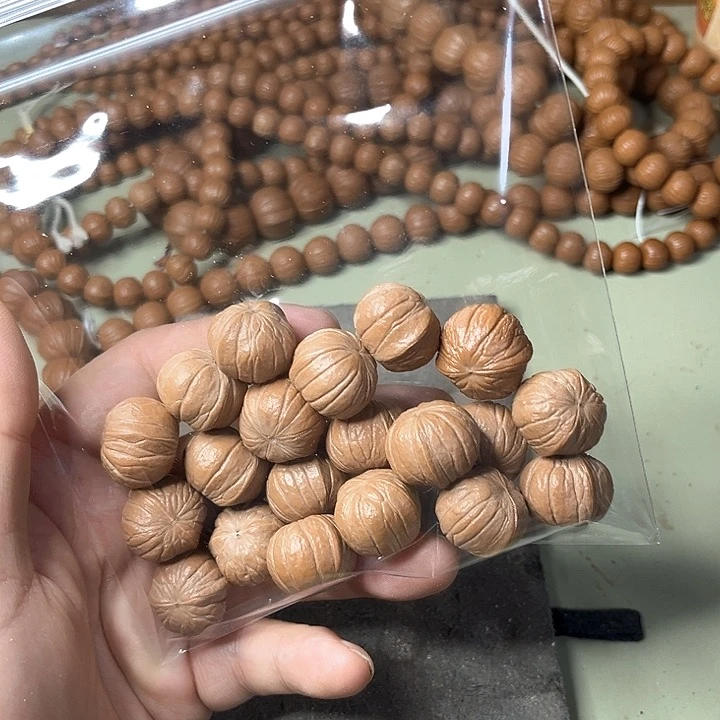 吊坠猴头核桃?***乐龙脊19手持