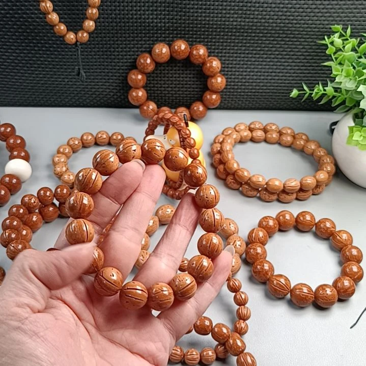 桃核手串铁籽密纹黄皮14