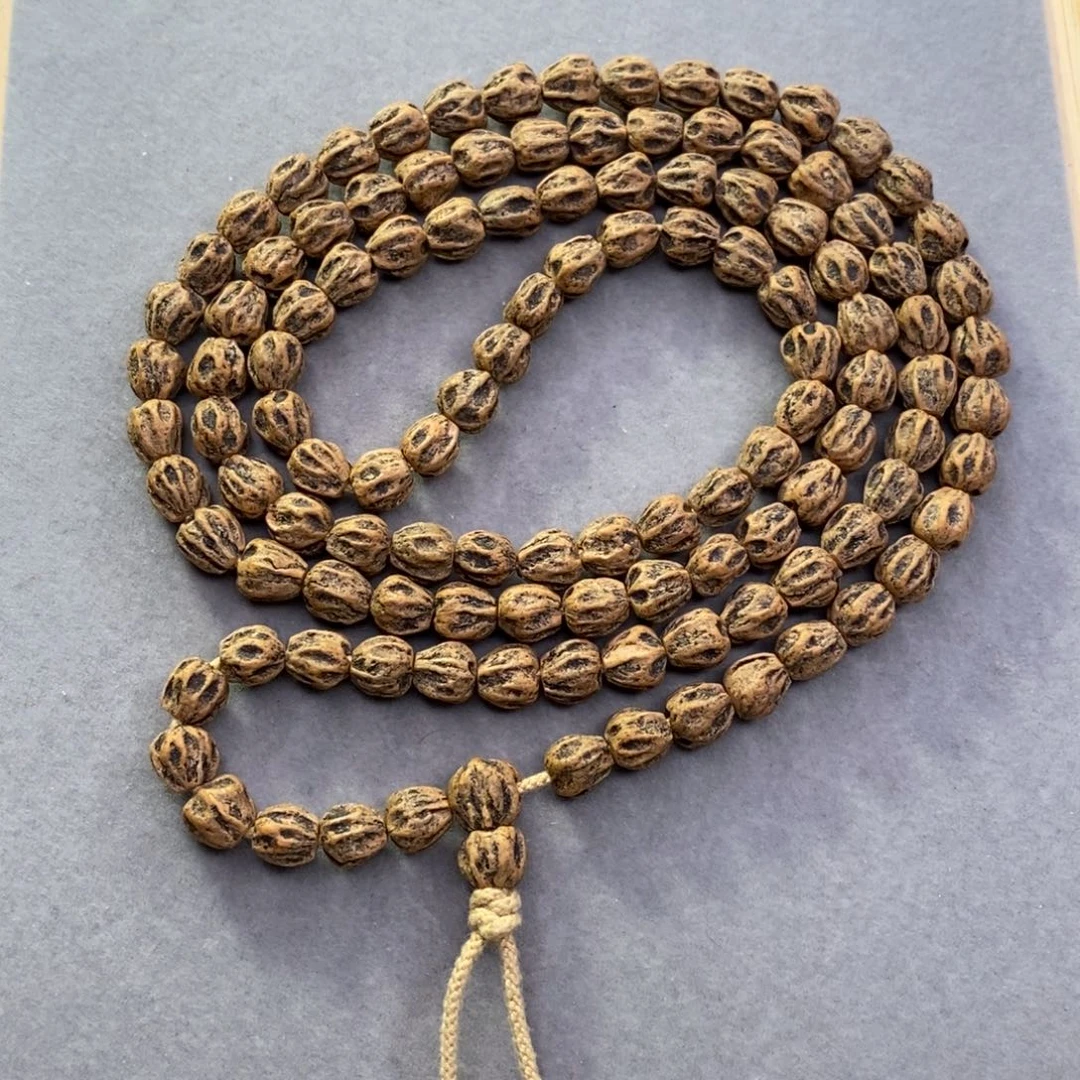 纪***纪柏香籽/百香籽吊坠