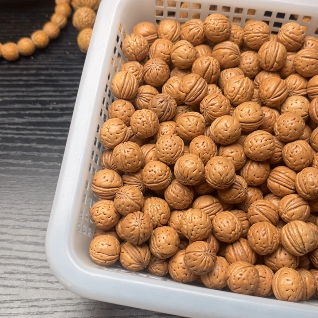 凤****文玩核桃吊坠小桃核散籽批发