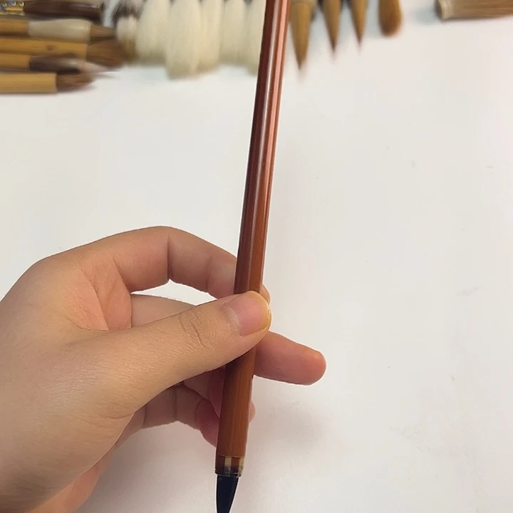 2支紫毫笔拱铜笔