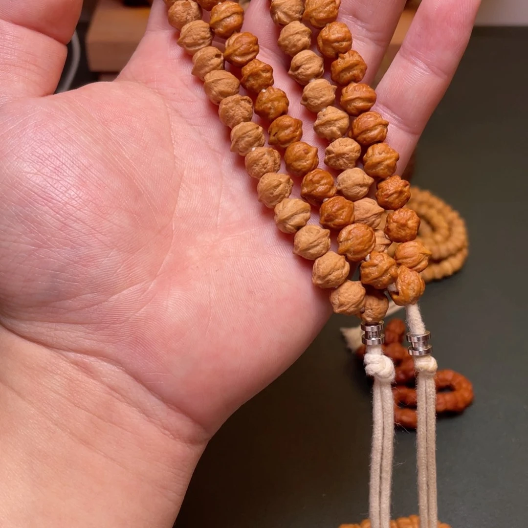 柏香籽/百香籽吊坠白牙横打手持