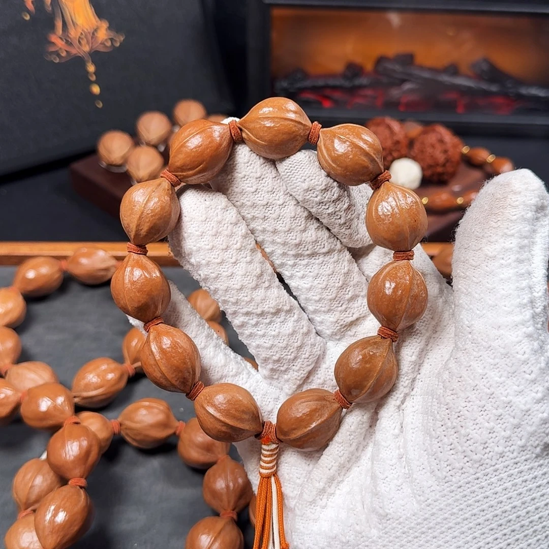 1.8*2.4短圆款原生态梅林铁核手串