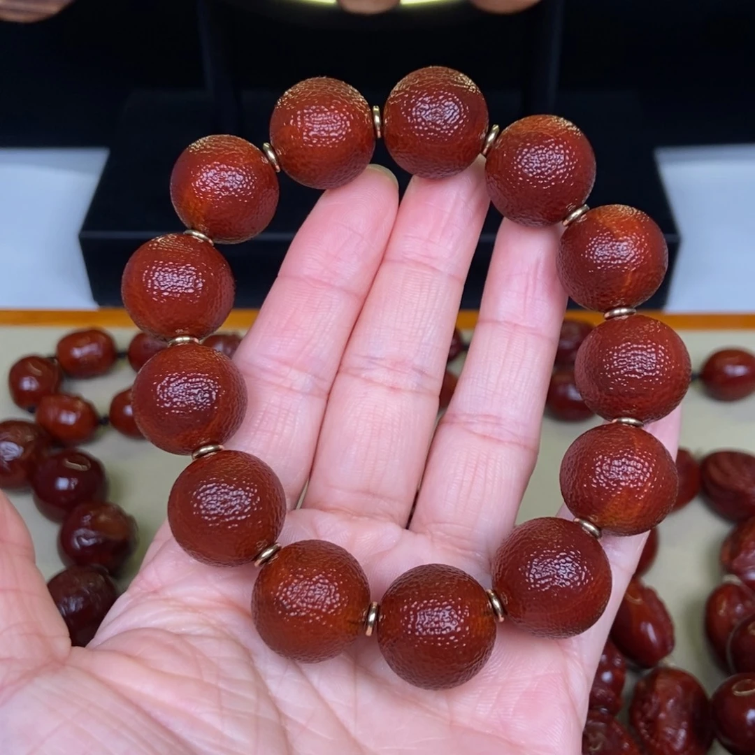 越***好橄榄核吊坠橘皮光珠