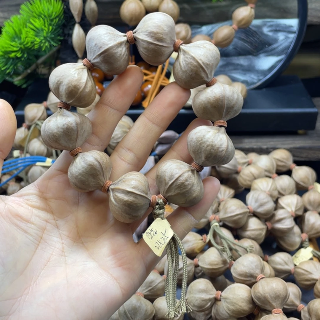 快***叔橄榄核吊坠2725四花铁核