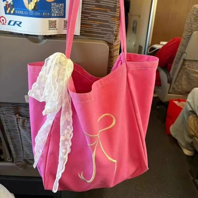 韩版粉色慵懒风大容量帆布包女2025新款简约学生上课包腋下单肩包