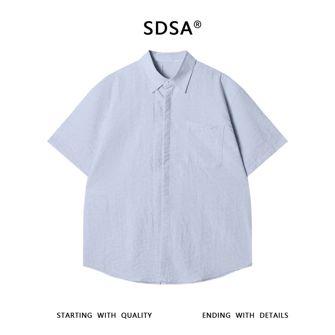 夏季高级感新款韩版简约口袋翻领短袖衬衫下摆不规则设计时尚衬衣