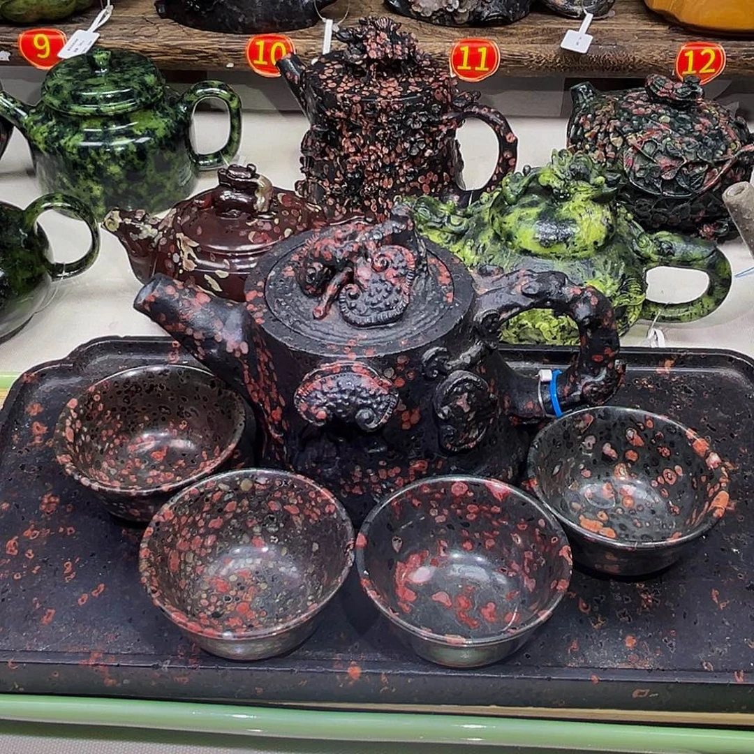 节***家梅花石安山玉一套