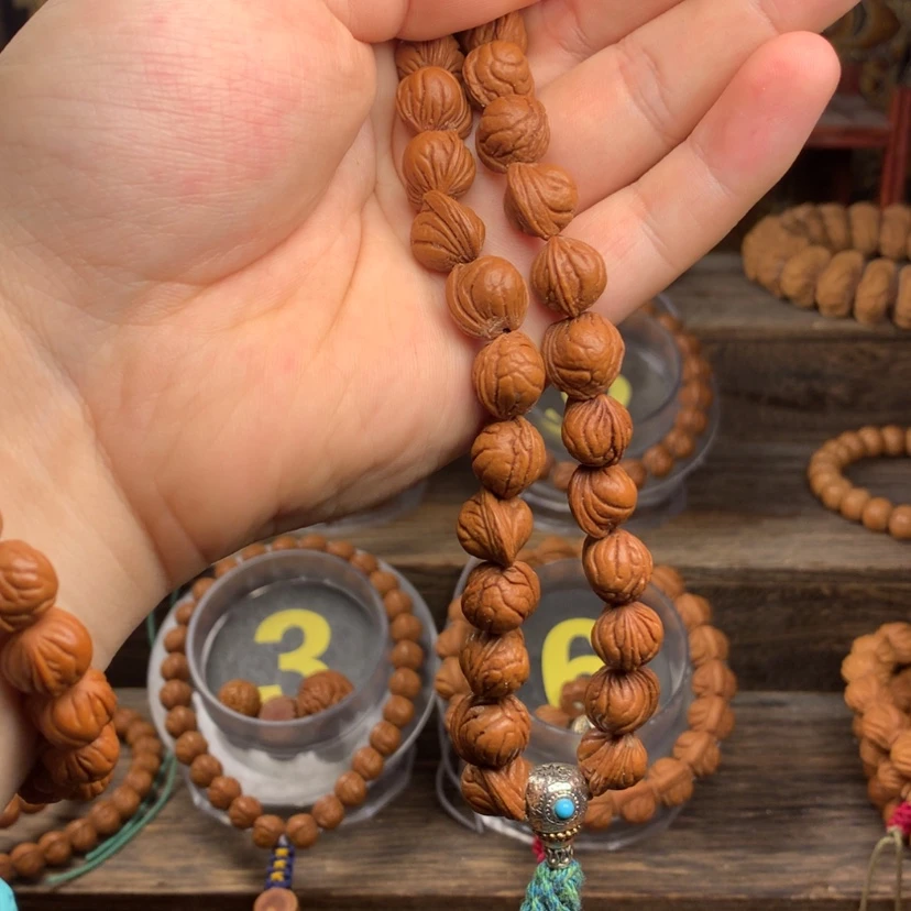 【闪购商品】桃核手串12无修玉龙脊25籽手持
