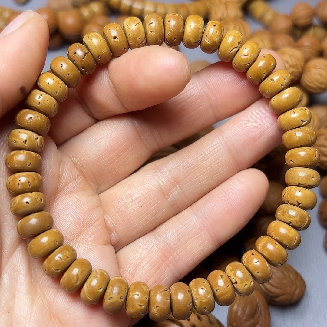 桃核吊坠风****?秦岭龙文算盘珠