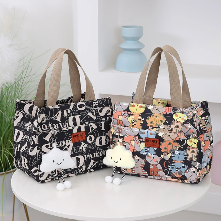 手提包新款大容量卡通上班化妆饭盒手提包通勤便当袋加厚时尚帆布