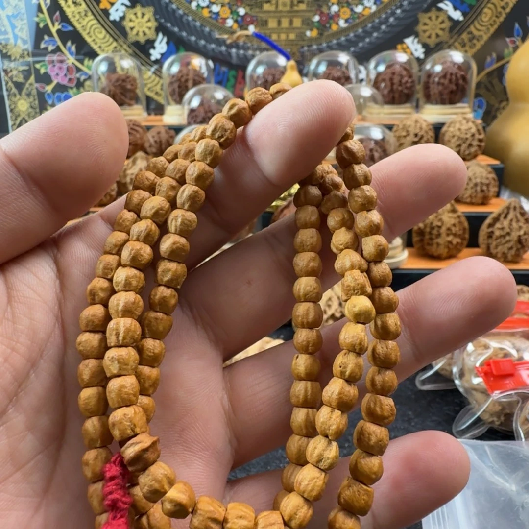 猴头核桃把件文玩手串。百香籽串