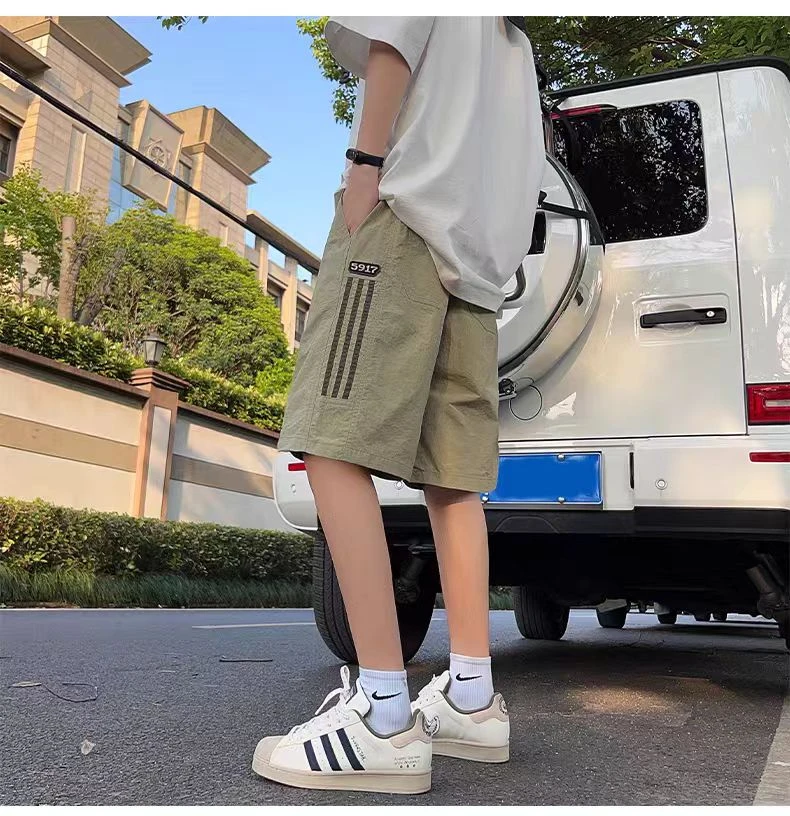 8625夏季潮牌美式复古高街痞帅三条杠运动五分裤透气孔速干短裤