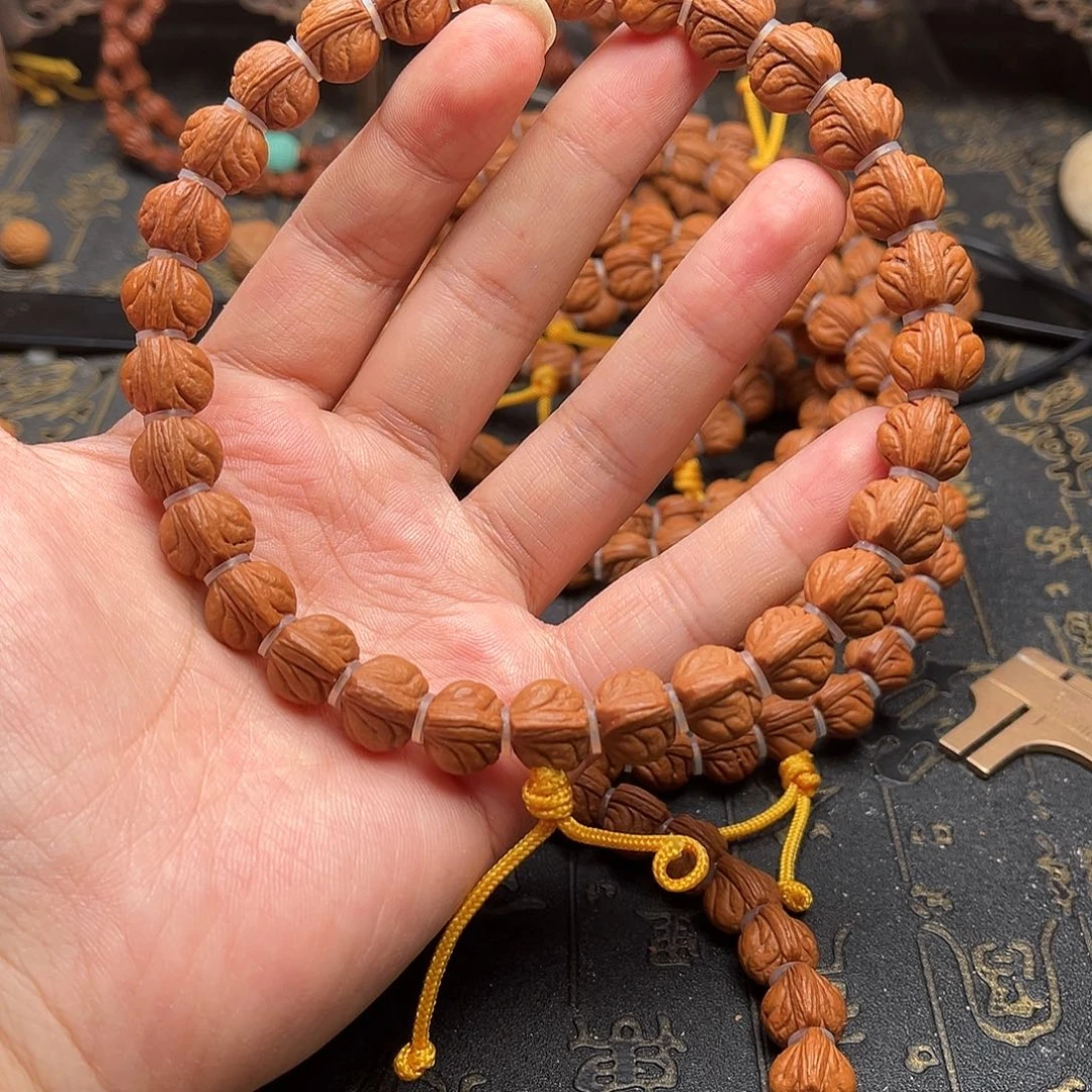 桃核吊坠玉龙手持