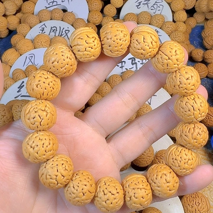 *****桃核吊坠盘锦奶豆桃核