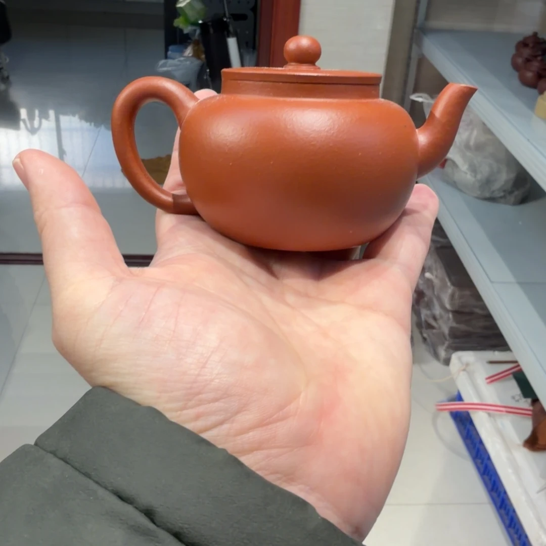 茶杯紫砂微瑕的壶