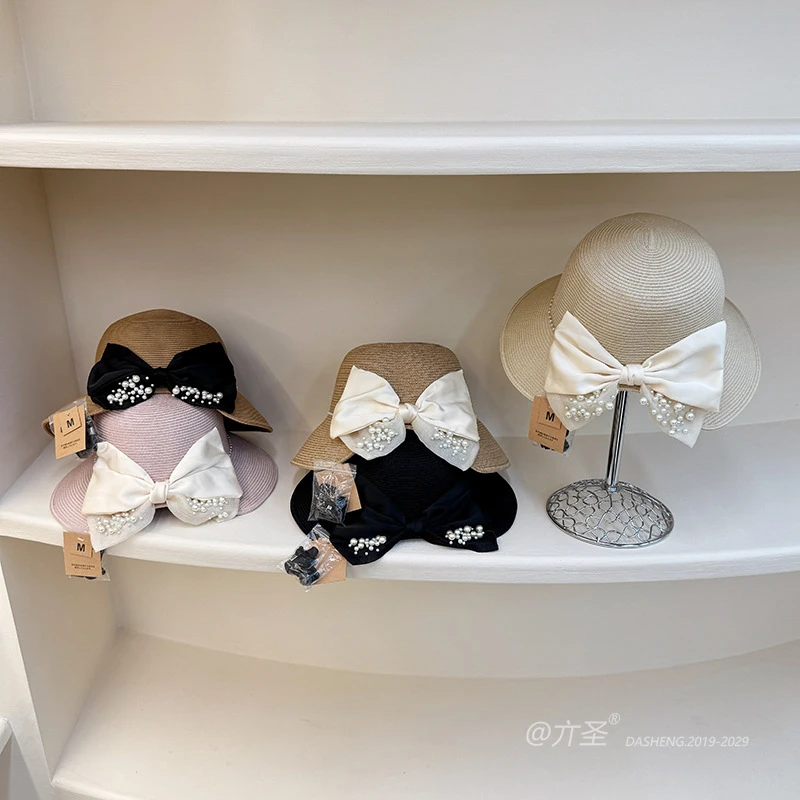 法式大帽檐草帽夏季赫本风遮阳礼帽韩国蝴蝶结珍珠飘带防晒渔夫帽