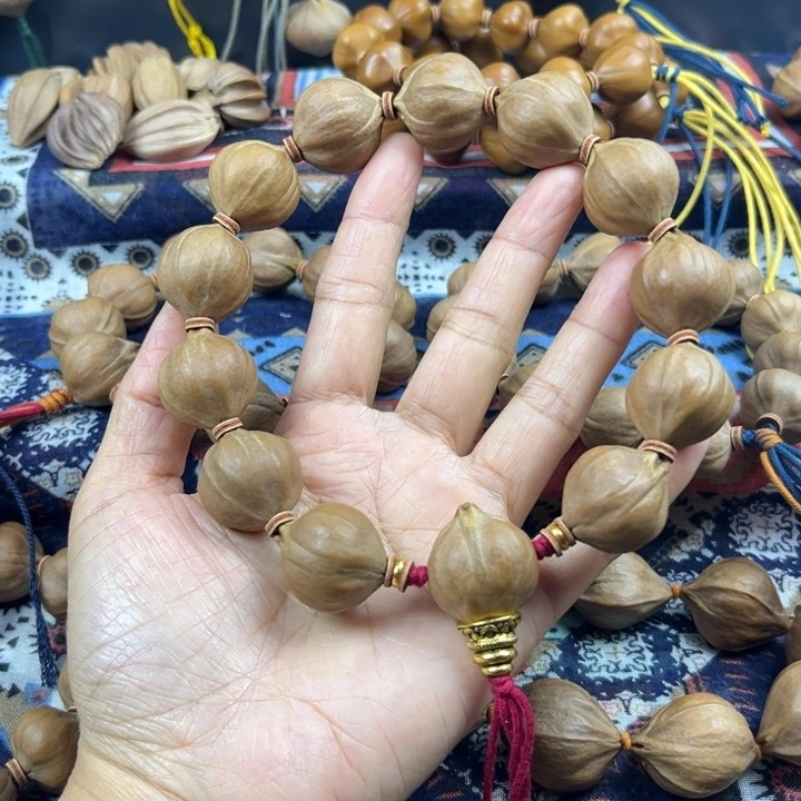 づ****橄榄核手串/手链三花2.1*2.4